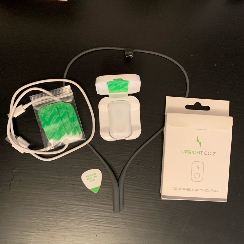 Upright go 2 - includes 15 adhesive pads, charger, and gray necklace.